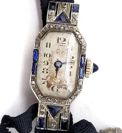 null ART DÉCO WATCH The first one holding rose-cut diamonds and blue stones, plant...