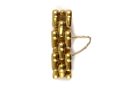 null BRACELET decorated with a succession of geometric links. Mounting in 18K yellow...