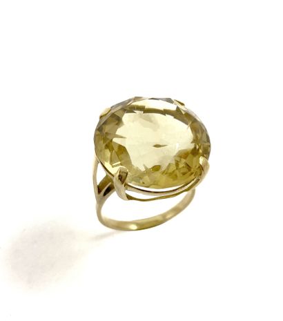 RING holding a citrine of 22 carats. Mounted...