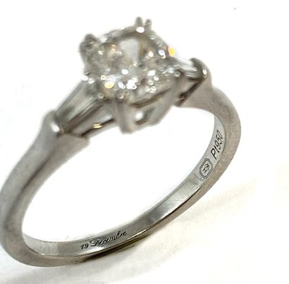 null HARRY WINSTON RING holding a 1.03 carat cushion diamond (E color, VS1 clarity)...