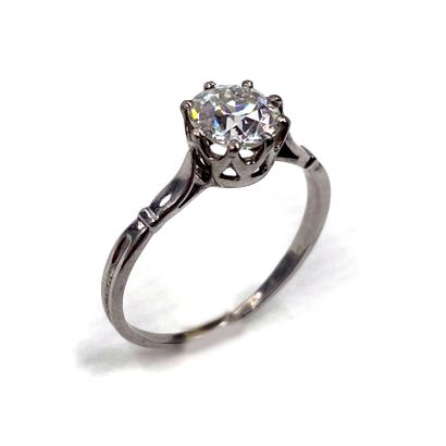 null SOLITARY RING holding a 1.66 carat old cut diamond. Mounted in 18K white gold....