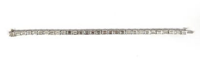 null LINE BRACELET set with a succession of emerald-cut diamonds approx. 6.9 carats,...
