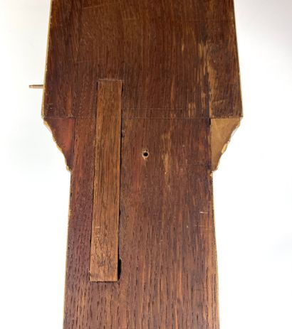 null THERMOMETER BAROMETER of rectangular shape, in mahogany veneer, it presents...