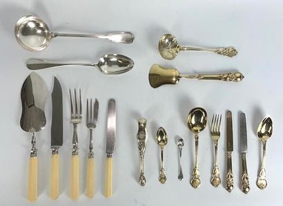  A vermeil silverware set chased with foliage including : - 2 serving forks with...