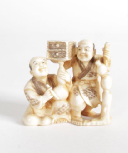 null JAPAN, About 1940 Two Okimono in marine ivory, one representing a karako (Chinese...
