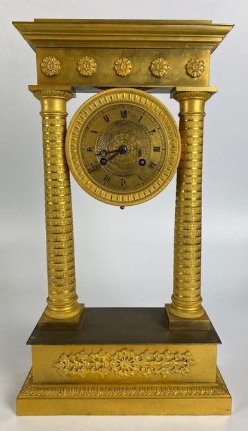 null PORTICAL HANGER in gilt bronze with two columns decorated with Ionic capitals...