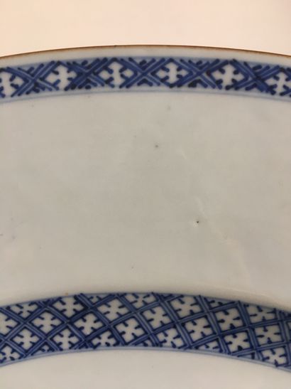null CHINA Large circular porcelain dish decorated in blue underglaze with a river...