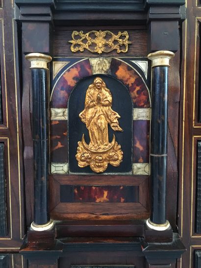 null CABINET in veneer and marquetry of scales, ebony and bone, with an architectural...