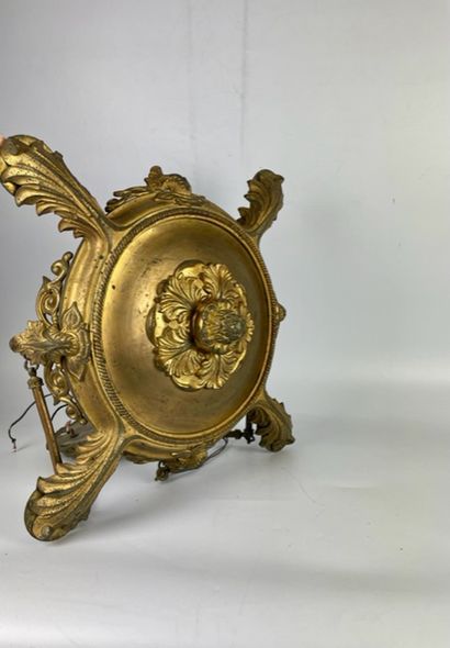 null Antique gilt bronze chandelier with foliage decoration and four arms of light....