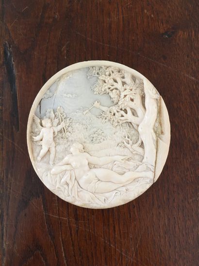 Round carved ivory BAS RELIEF decorated with...