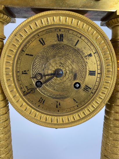 null PORTICAL HANGER in gilt bronze with two columns decorated with Ionic capitals...