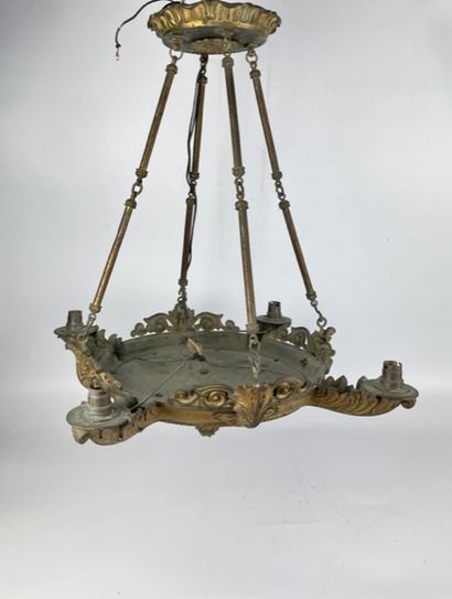 null Antique gilt bronze chandelier with foliage decoration and four arms of light....