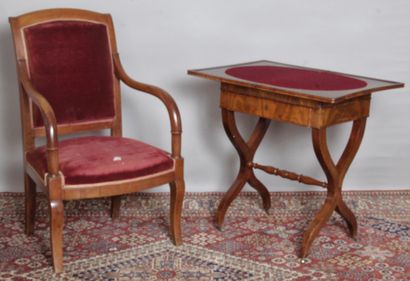 A Restoration period walnut armchair with...