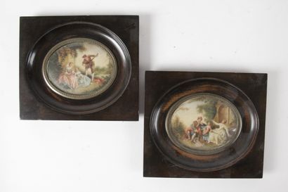 null PAIRE DE MINIATURES À VUE OVALES d’après WATTEAU : scènes de galanteries, cerclage...