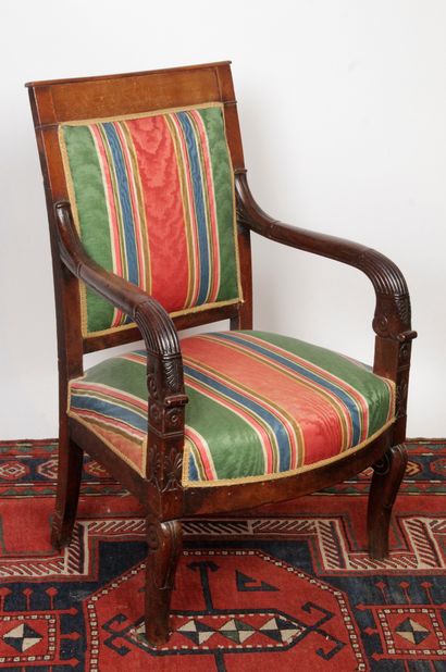 null A mahogany and mahogany veneer straight back armchair, molded and carved with...