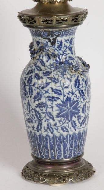 null China, late 19th century Blue-white porcelain vase, the body and the neck evoking...