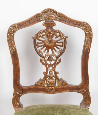 null SET OF SIX CHAIRS in molded, carved and openwork natural wood and partially...