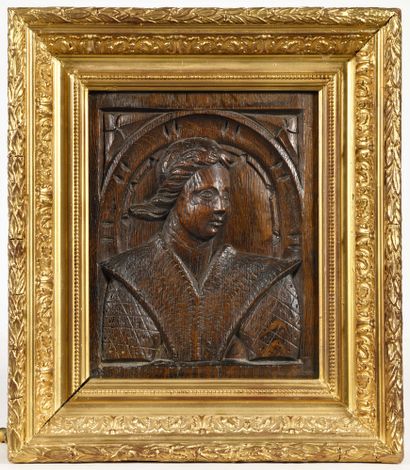 null PANEL IN SCULPT OAK representing a bust of a woman turned in three-quarter view...