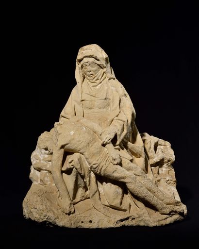 null VIRGIN OF MERCY IN SCULPTED LIMESTONE. The Virgin carries on her knees the body...
