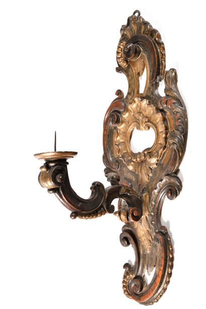 null PAIR OF MONUMENTAL LIGHTING ARMS in patinated and silvered wood, with openwork...
