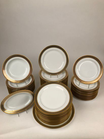 null LIMOGES FRANCE Part of table service in white porcelain with gold and silver...