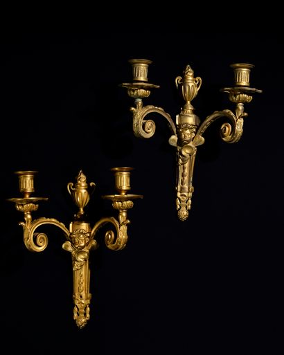 null BEAUTIFUL PAIR OF LIGHTINGS with two arms of light in gilded and chased bronze,...