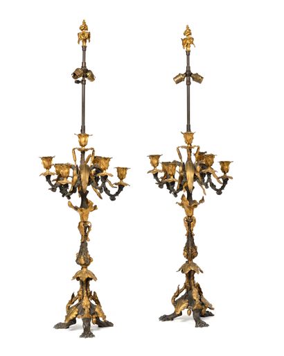 null IMPORTANT PAIR OF CANDELABRES WITH SEVEN LIGHTING ARMS in partly gilded bronze...