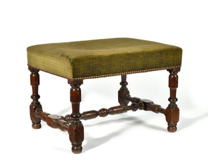 null RECTANGULAR TABOURET in turned walnut, resting on a base with brace. Middle...