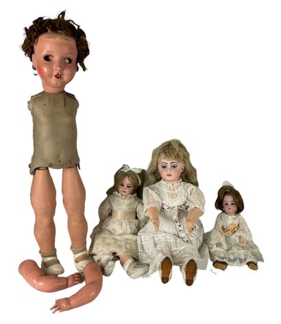 FOUR DOLLS (three in porcelain and one celluloid)...
