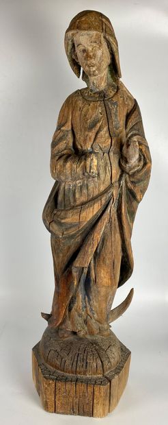 SAINTE in carved wood with traces of polychromy....