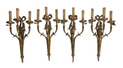 Suite of FOUR ormolu and varnished sconces...