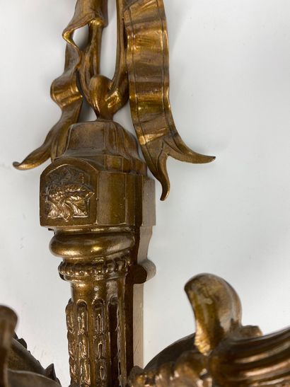 null Suite of FOUR ormolu and varnished sconces with three moving light arms decorated...