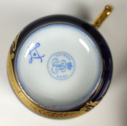 null SEVRES Service said "head to head" in blue and gold porcelain with polychrome...