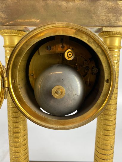 null PORTICAL HANGER in gilt bronze with two columns decorated with Ionic capitals...