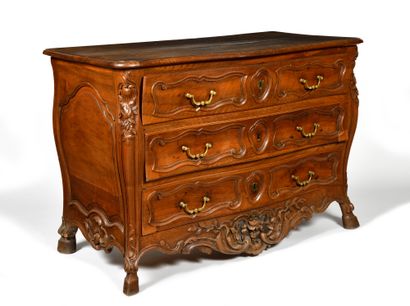 null WOODEN COMMODE in molded and carved walnut opening with three drawers in front,...