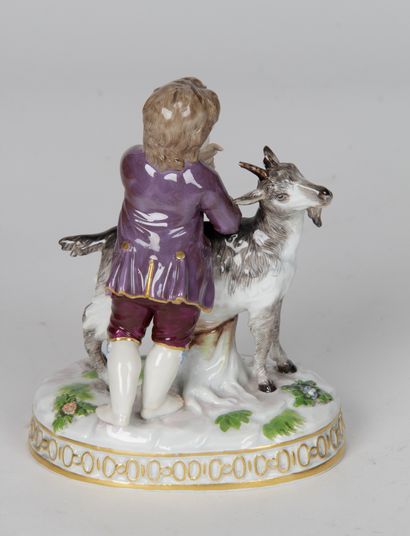 null POLYCHROME PORCELAIN GROUP FROM MEISSEN, representing a child and a goat. H....