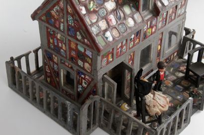 null POPULAR WORK: DOLL HOUSE in wood, plaster and polychrome earthenware shards....