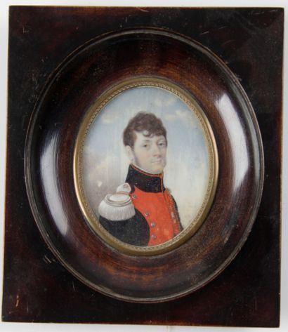 null "PORTRAIT OF AN OFFICER, in blue and red uniform " Miniature of oval form. Inscribed...