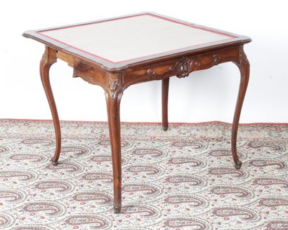  A LOUIS XV STYLE GAME TABLE in rosewood and rosewood veneer with a portfolio top...