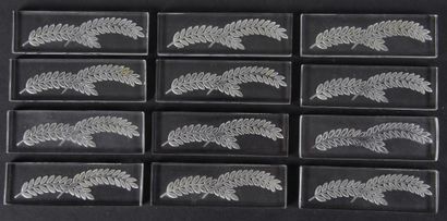 null LALIQUE France : SUITE of twelve knife-holders " Hortense " in white moulded-pressed...
