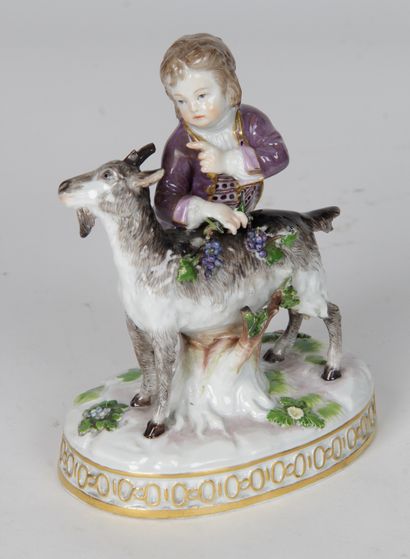 null POLYCHROME PORCELAIN GROUP FROM MEISSEN, representing a child and a goat. H....