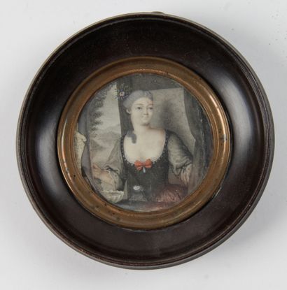 null "PORTRAIT OF A WOMAN OF THE XVIIIth CENTURY WITH A RED NECK" Oval miniature,...