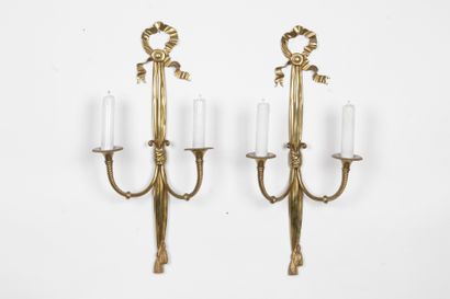 Pair of gilt bronze wall lights, with two...