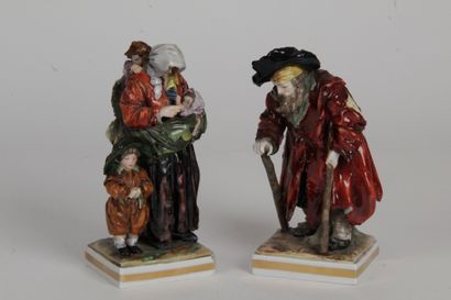 null NAPLES CAPODIMONTE. Two groups in polychrome porcelain representing a beggar...