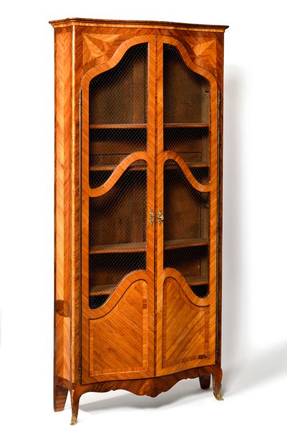 A rosewood and violet wood bookcase with...