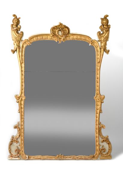 LARGE WOODEN MIRROR in gilded wood decorated...