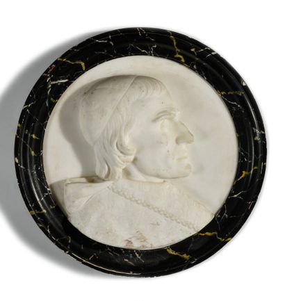 null Two profiles of popes Pair of white marble medallions presented in faux marble...