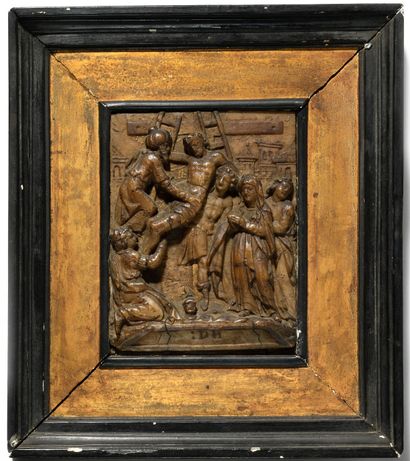  Alabaster plaque carved in bas-relief with gold highlights representing the Descent...