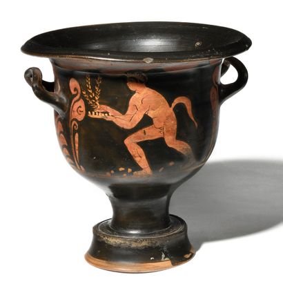 null CRATER WITH RED FIGURE. Ceramic with painted decoration of a satyr on one side...