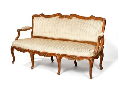 null RARE BEECH SOFA, finely molded and carved, with frame, the flat back with scrolls...